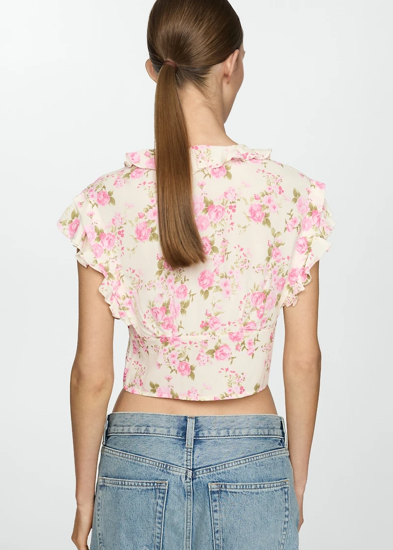 Floral blouse with bow closure