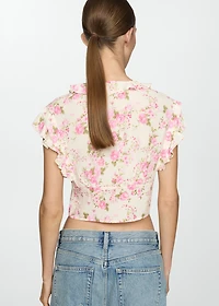 Floral blouse with bow closure