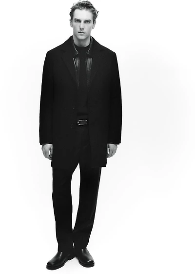 Wool coat with quilted interior hood