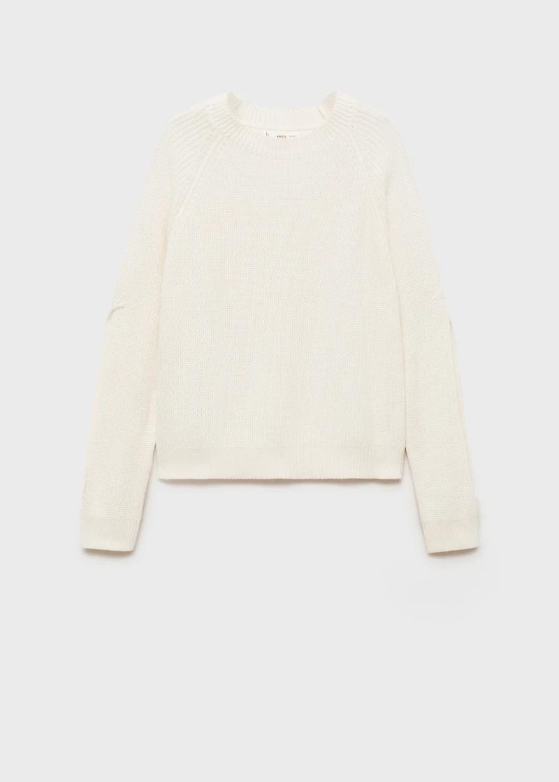 Knitted sweater with openings