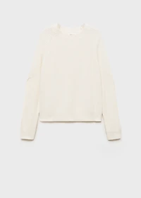 Knitted sweater with openings