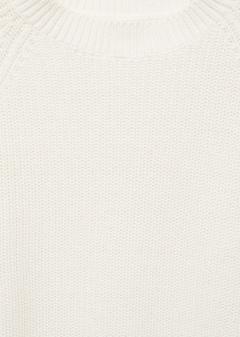 Knitted sweater with openings