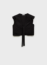 Quilted vest with pleat