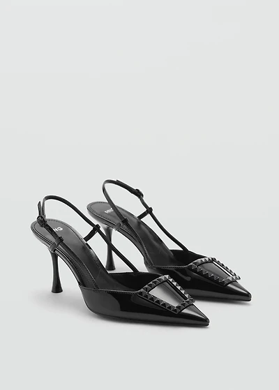 Patent leather slingback-heeled shoes