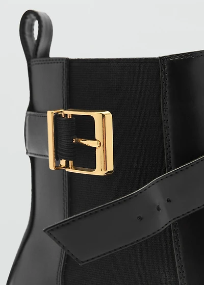 Ankle boots with elastic panel and buckle