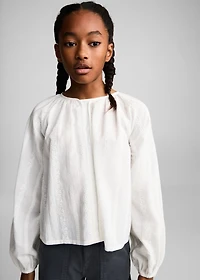 Fluid blouse with embroidered details