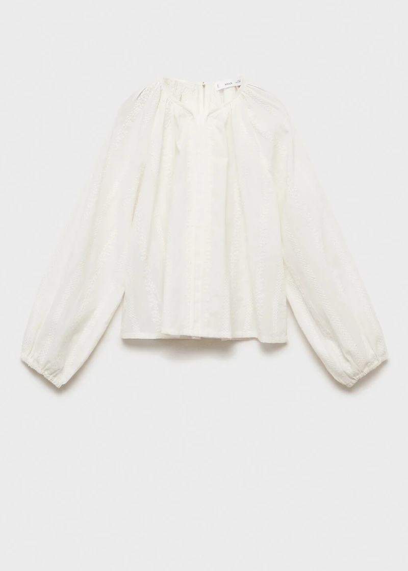 Fluid blouse with embroidered details