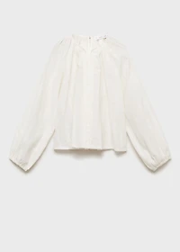 Fluid blouse with embroidered details