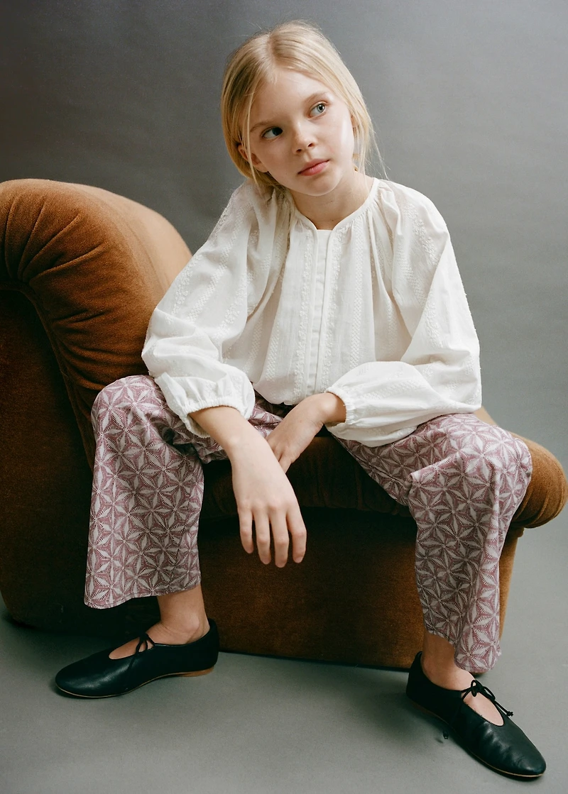 Fluid blouse with embroidered details