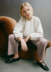 Fluid blouse with embroidered details