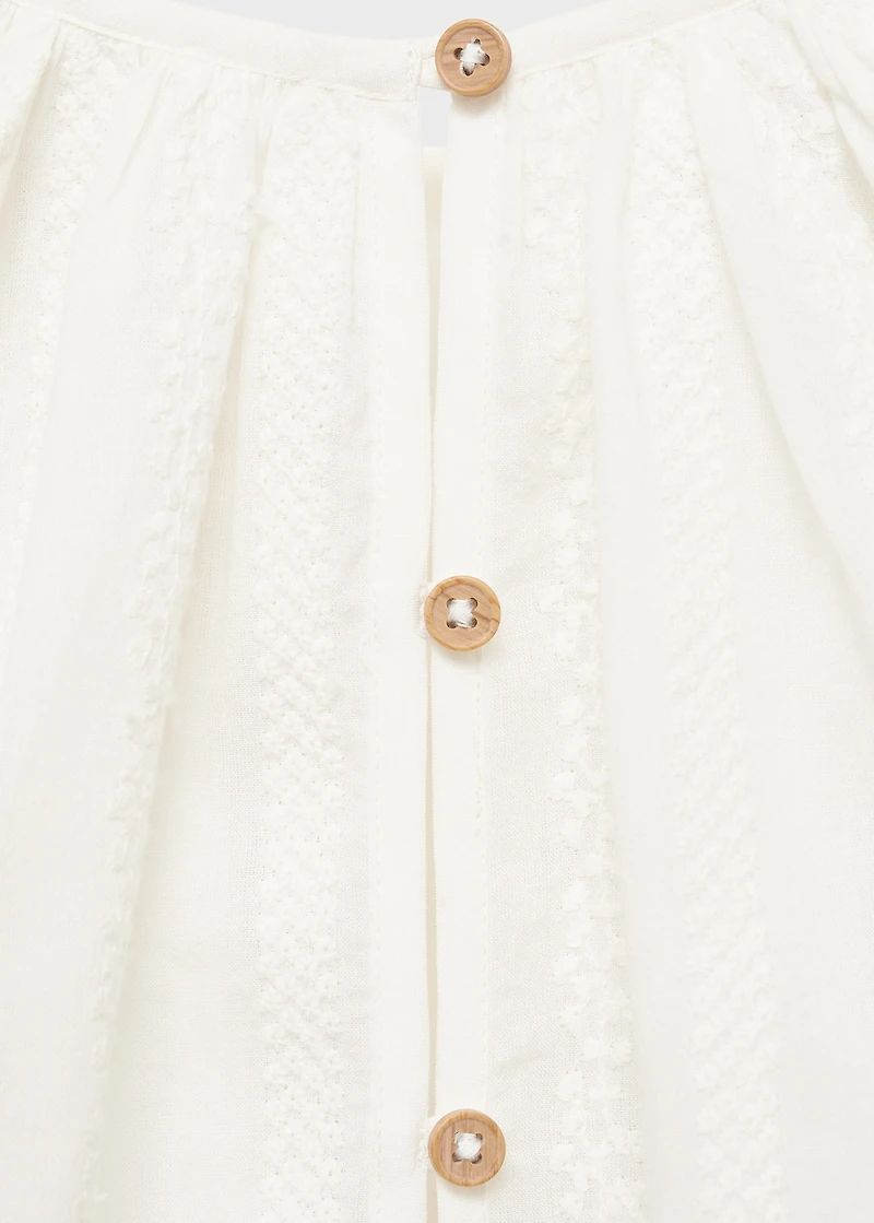 Fluid blouse with embroidered details