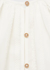 Fluid blouse with embroidered details