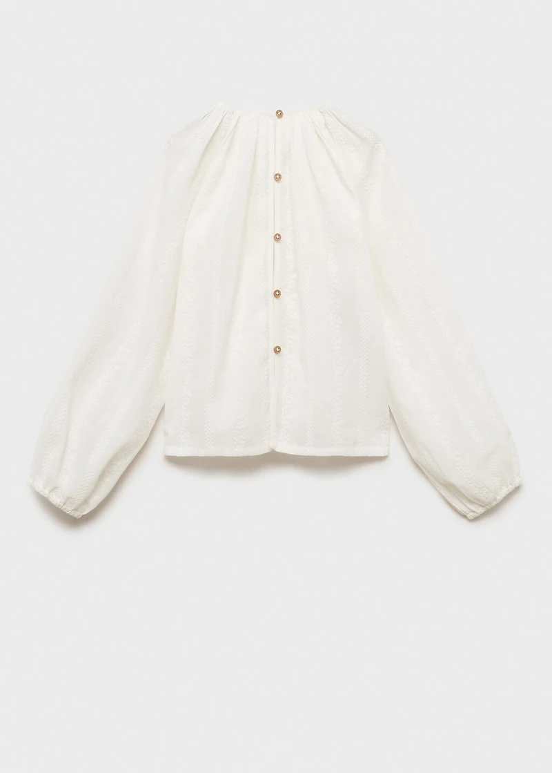 Fluid blouse with embroidered details