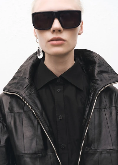 Fitted shirt with cuffless sleeves