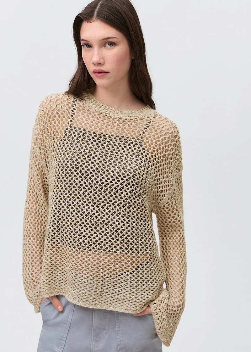 Knit sweater with lace pattern
