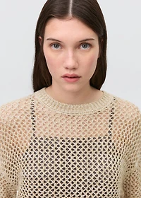 Knit sweater with lace pattern