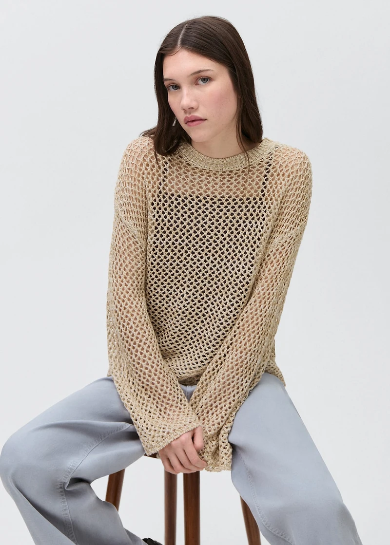 Knit sweater with lace pattern