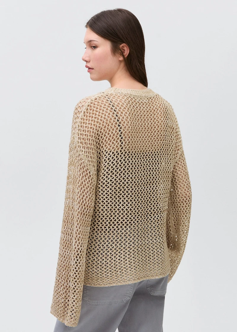 Knit sweater with lace pattern