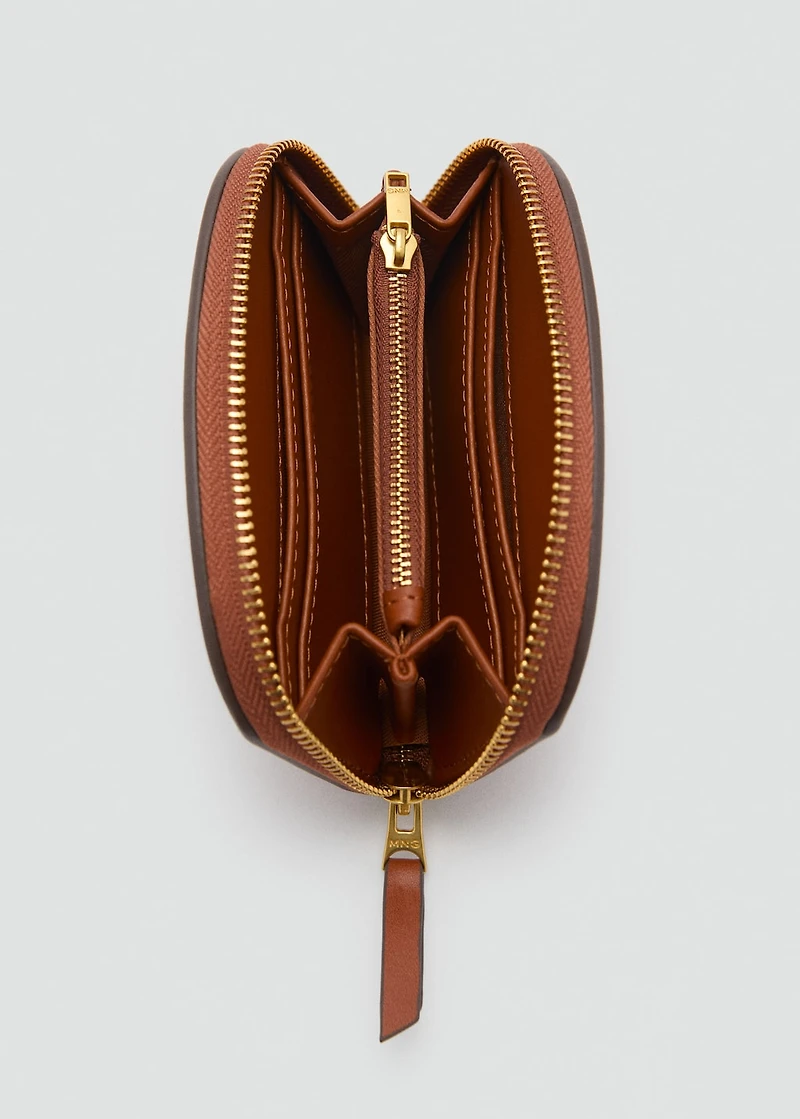 Oval-shaped faux-leather wallet