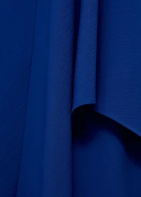 Asymmetrical dress with strap and buckle