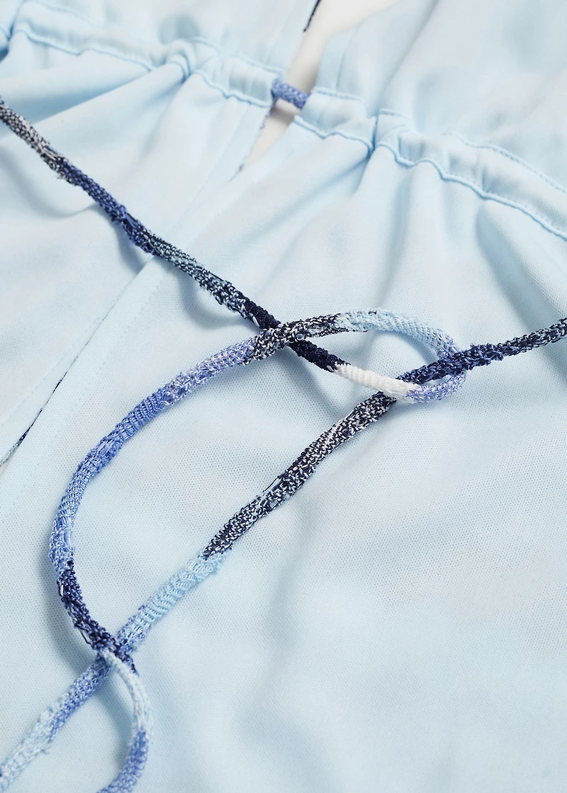 Zig-zag knitted top with lace pattern