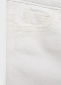 Frayed low-rise skinny jeans