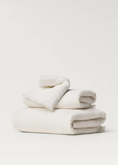 Stripe-embossed hand towel with fringes