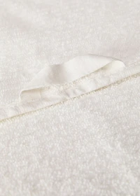 Stripe-embossed hand towel with fringes