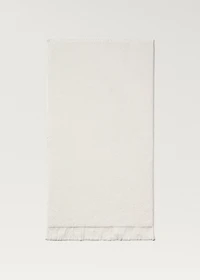 Stripe-embossed hand towel with fringes
