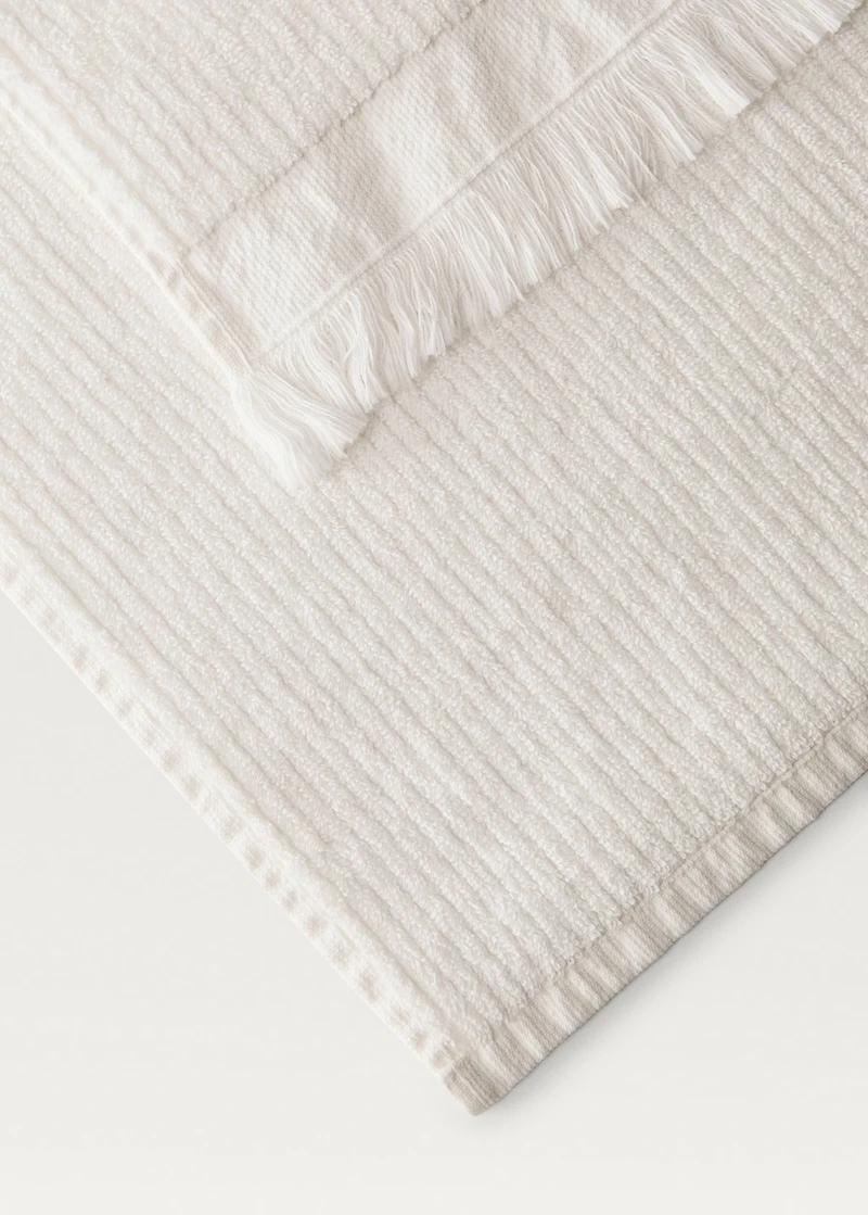 Stripe-embossed bath towel with fringes