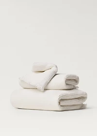 Stripe-embossed washbasin towel with fringes