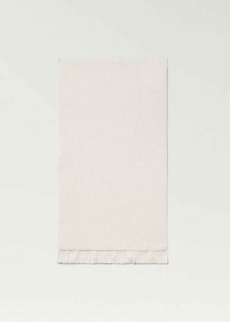 Stripe-embossed washbasin towel with fringes