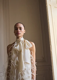 Halter dress with feather decoration