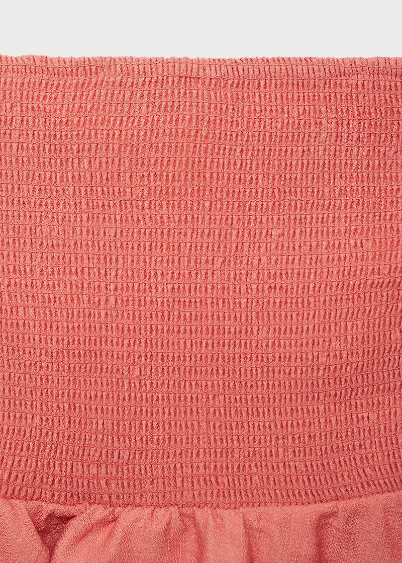 Asymmetrical strapless top