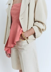 Asymmetrical strapless top