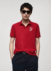 100% cotton polo shirt with embroidered graphic on the chest