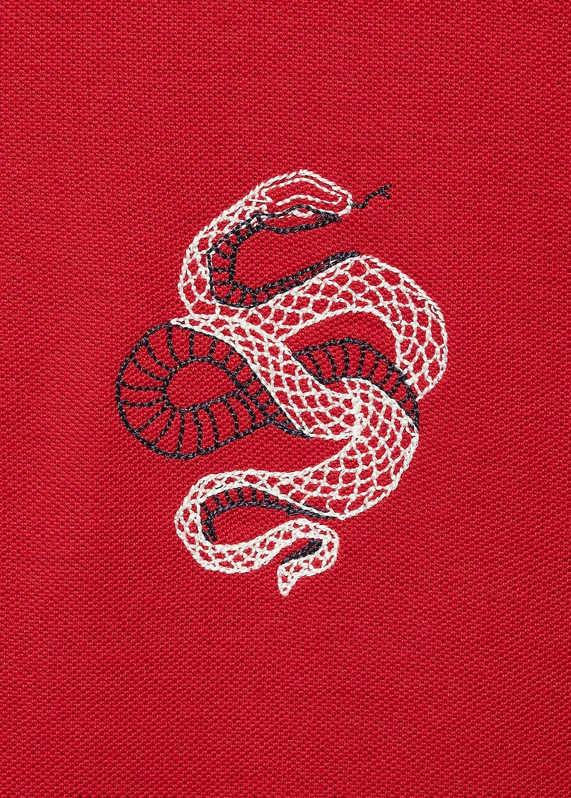 100% cotton polo shirt with embroidered graphic on the chest