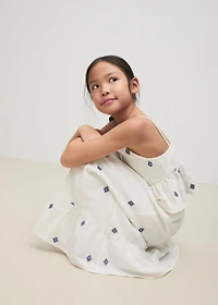 Ruffled blouse with embroidered details