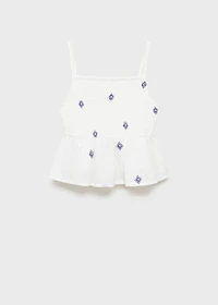 Ruffled blouse with embroidered details