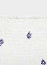 Ruffled blouse with embroidered details