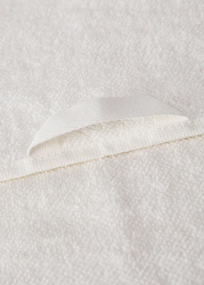 Hand towel with waffle trim and fringe