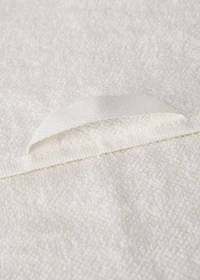 Hand towel with waffle trim and fringe