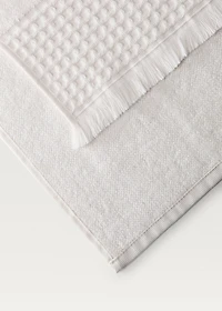 Hand towel with waffle trim and fringe