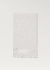 Hand towel with waffle trim and fringe