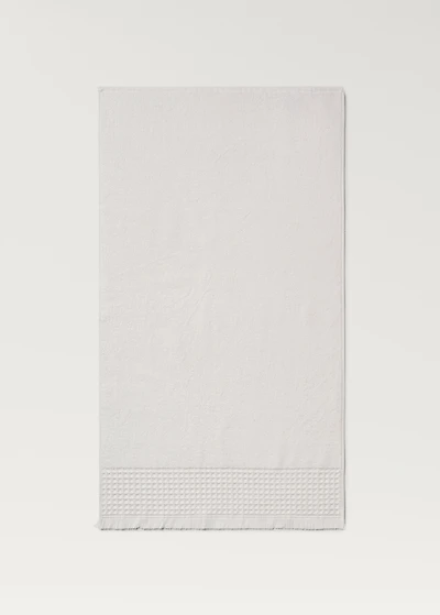 Washbasin towel with waffle trim and fringe