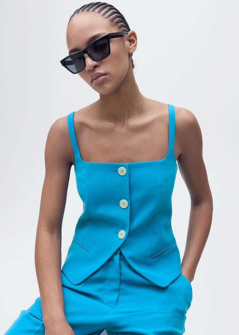 Suit vest with open back