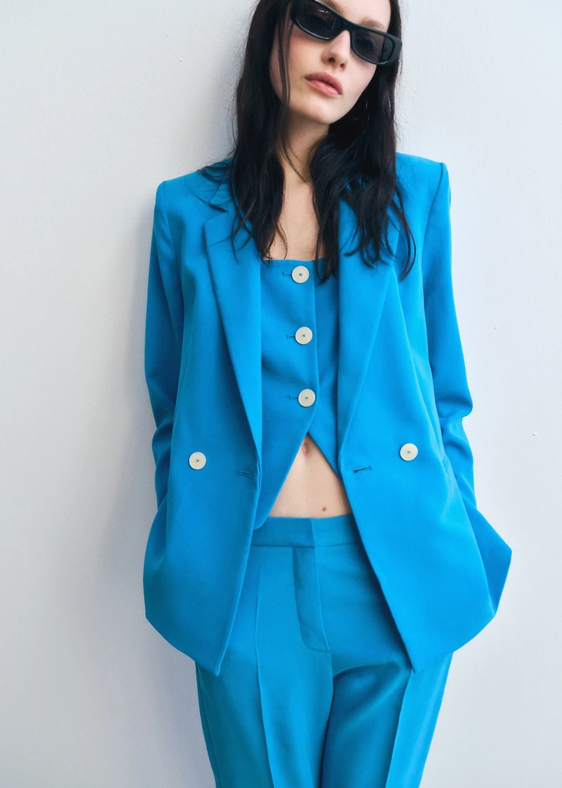 Suit vest with open back