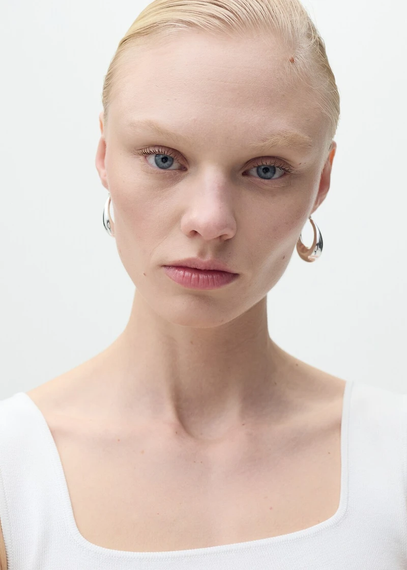 Fine-knit top with low neckline