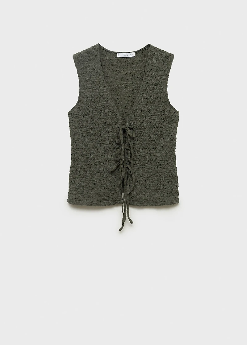 Textured top with bow