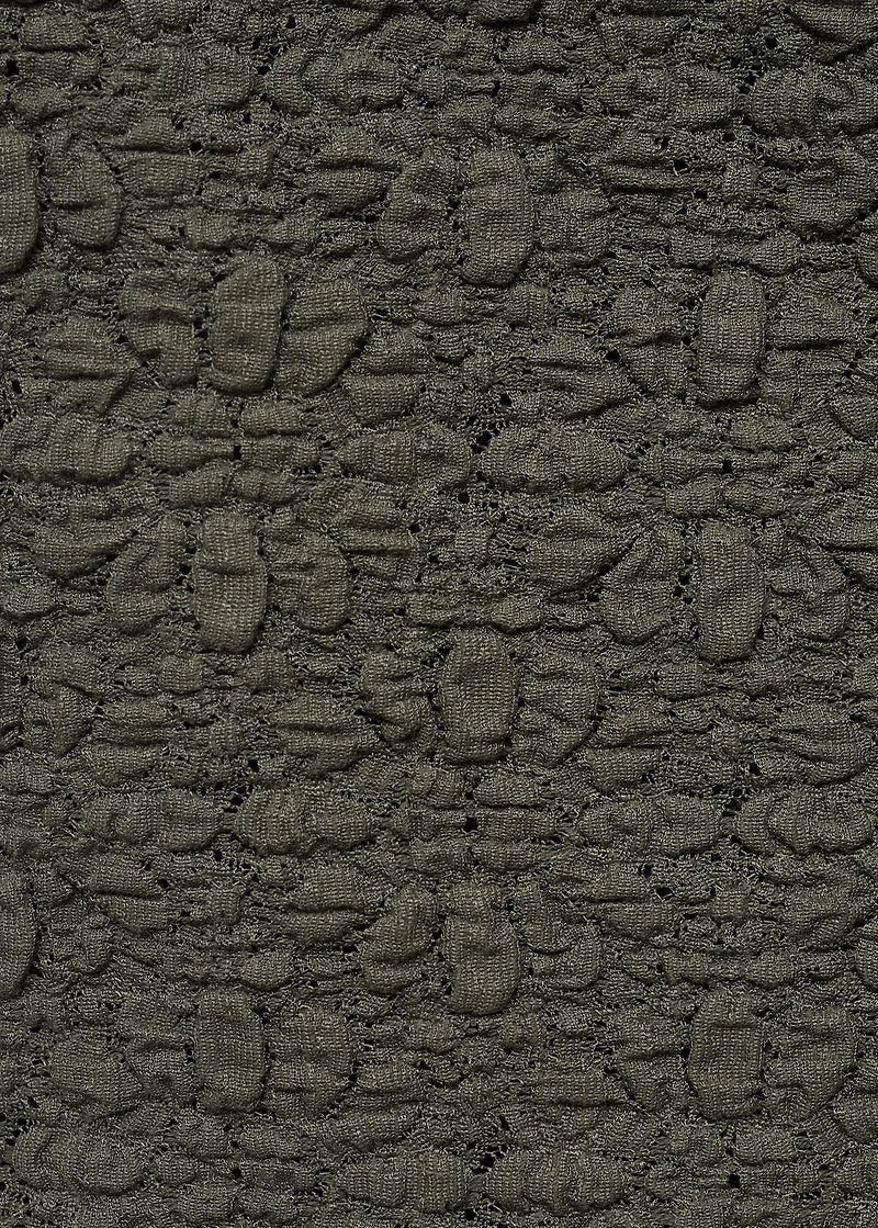 Textured top with bow